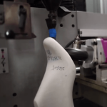 A machine to measure a hand shaped shoe last